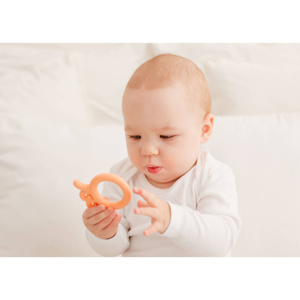 Gryzak silikonowy Ośmiornica Baby Brzoskwiniowy, Giligums